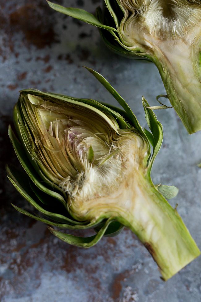 Cut Artichokes before Searing- A Stack of Dishes