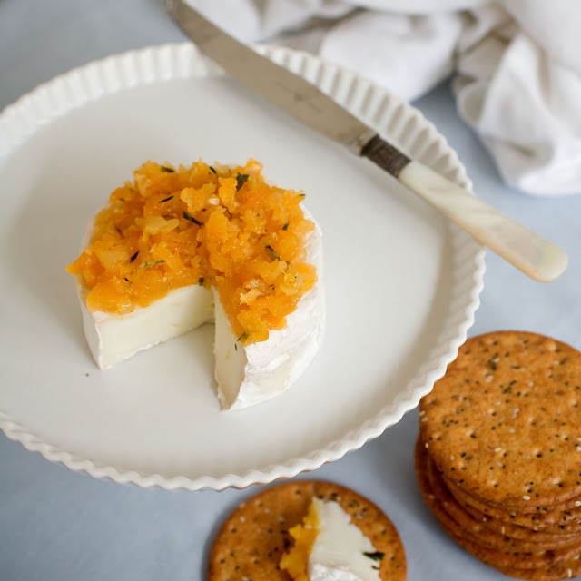 tapenade, apricot tapenade, a stack of dishes