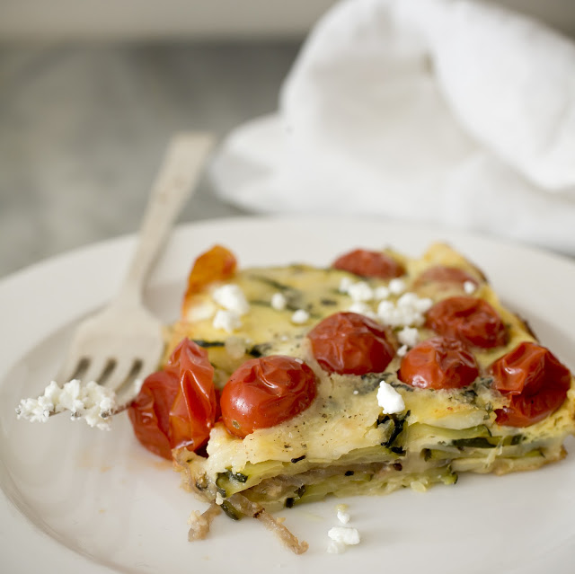 tomato clafoutis, savory clafoutis, clafoutis recipe, a stack of dishes